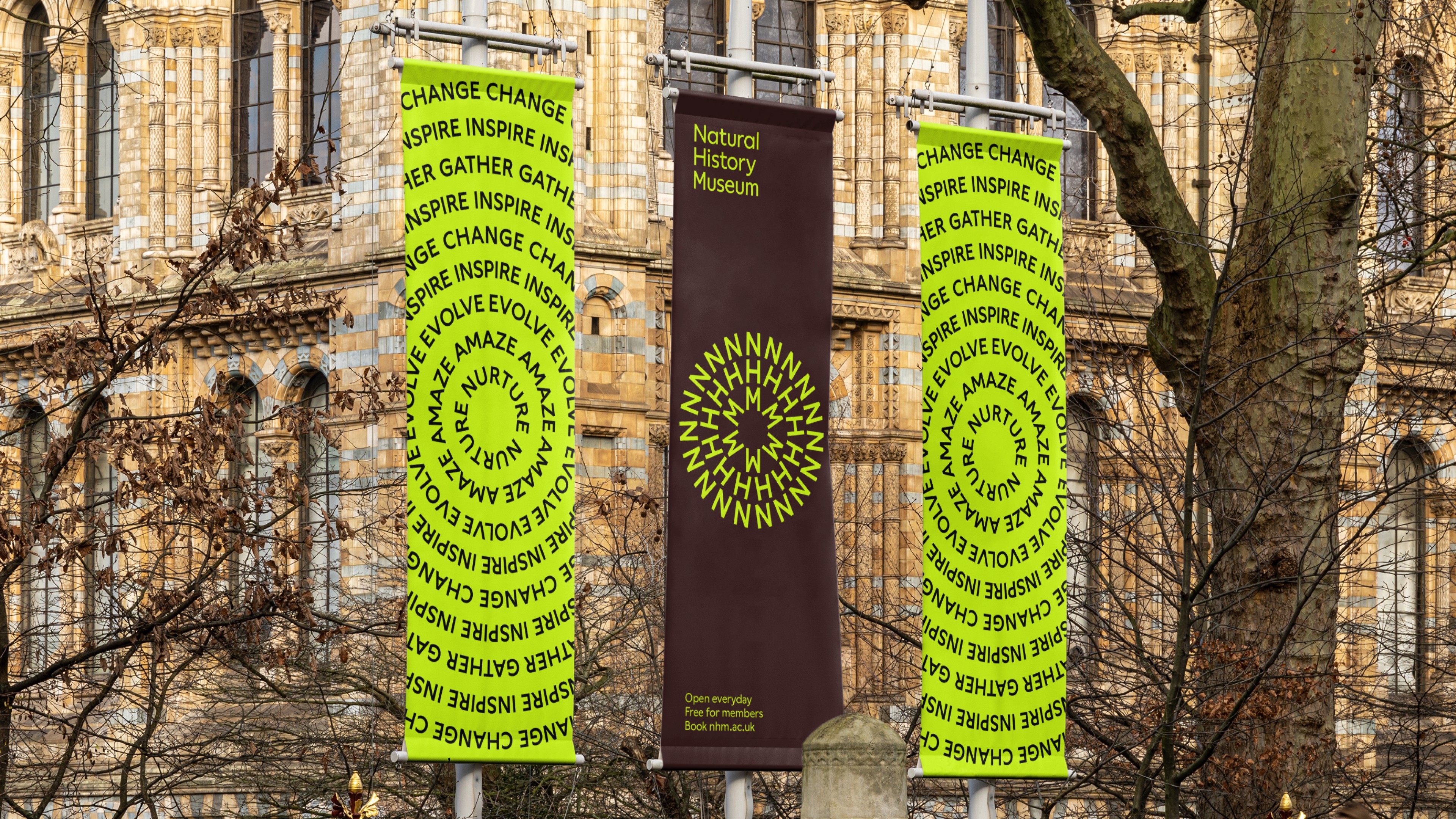 Graphic of a typography specimen showing the alphabet and numerals on top of a dark gray background.