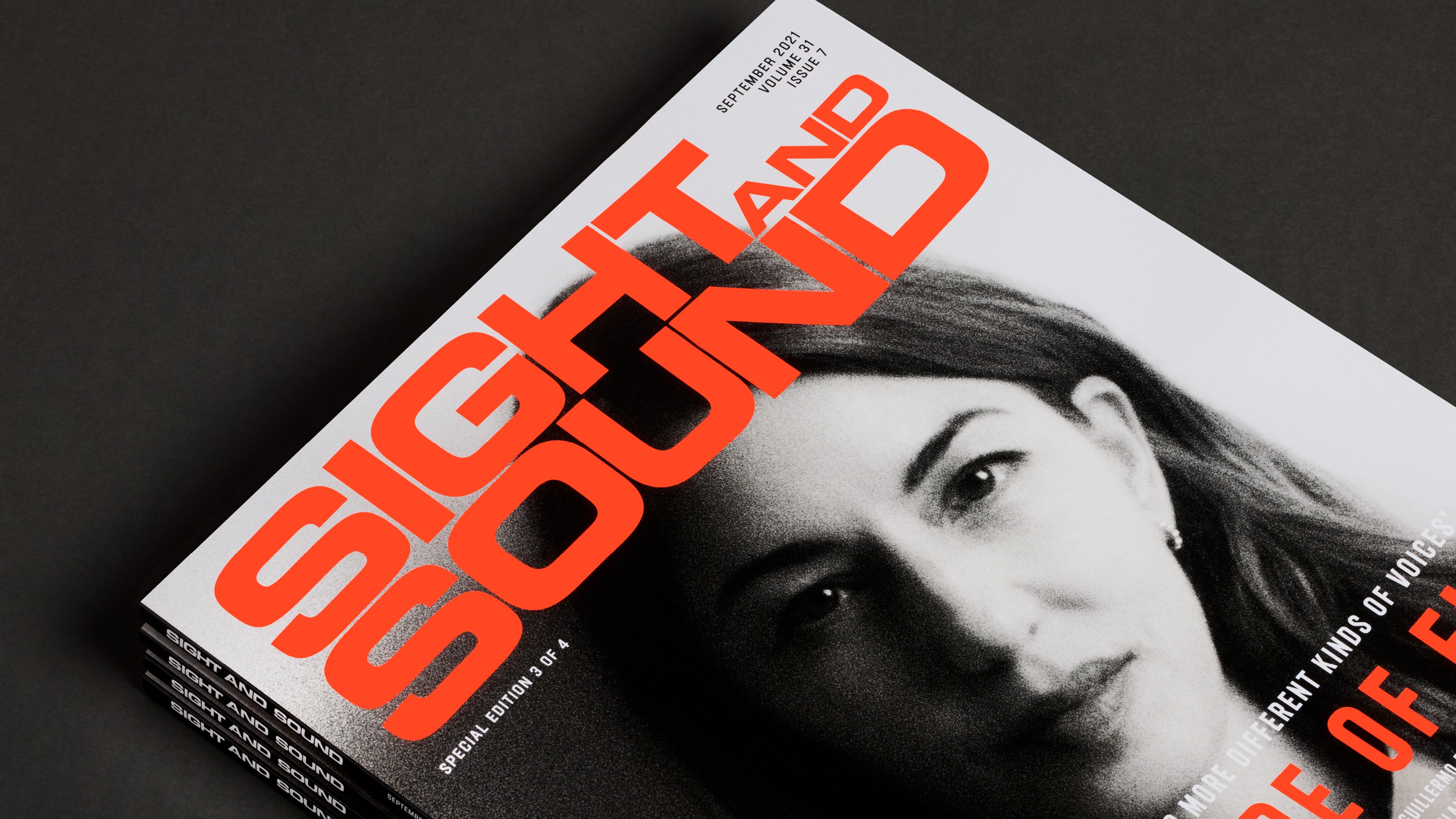 Stylized blue and pink image of a whiskey glass with the wordmark of Vèloce in pink all-caps letters above.